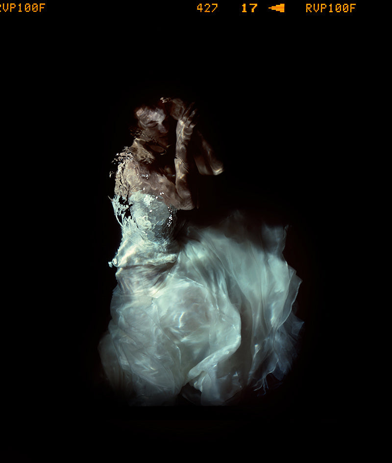 Chromatic Depths: Mythical Figures Illuminated in Chiaroscuro Bride Underwater
