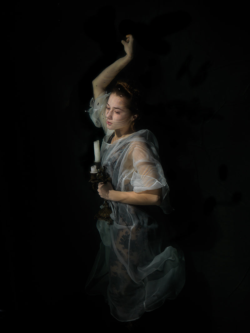 Religious figures: Dissolved Sadness in Chiaroscuro Waters