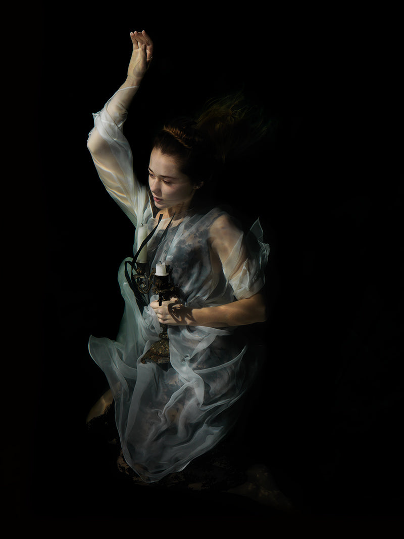 Surreal Submergence: Religious Figures in Underwater artwork series