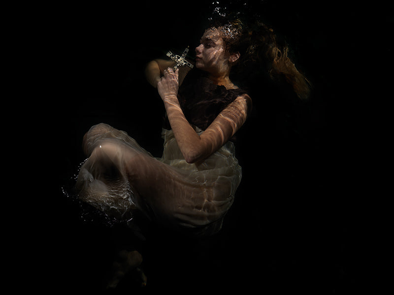 Enigmatic Photography: Art Historical Figures in Chiaroscuro Depths