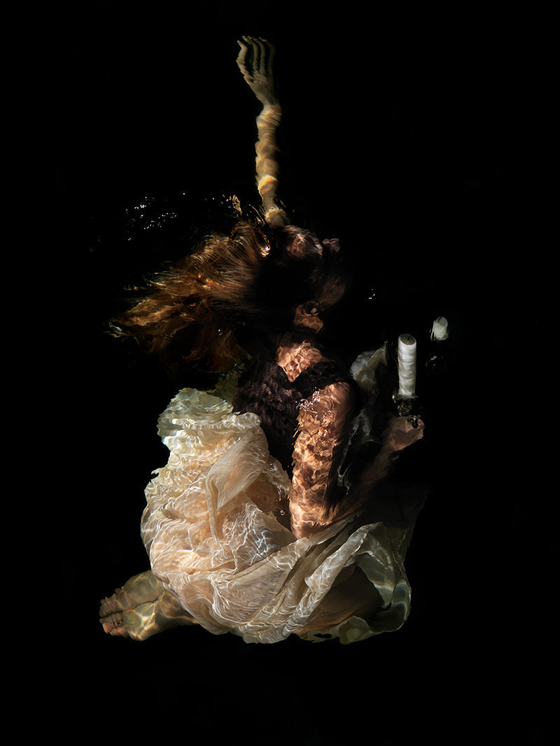 Water Whispers of Myth: Underwater Depictions of Dissolved Sadness