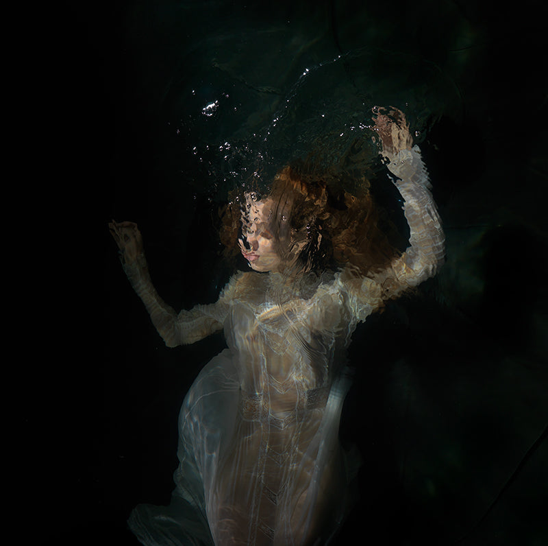 Chiaroscuro Beneath the Waves: Caravaggio's Influence