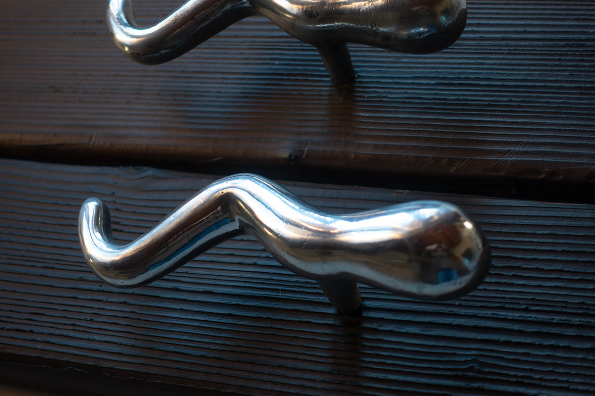 Three sizes of tadpole drawer handles