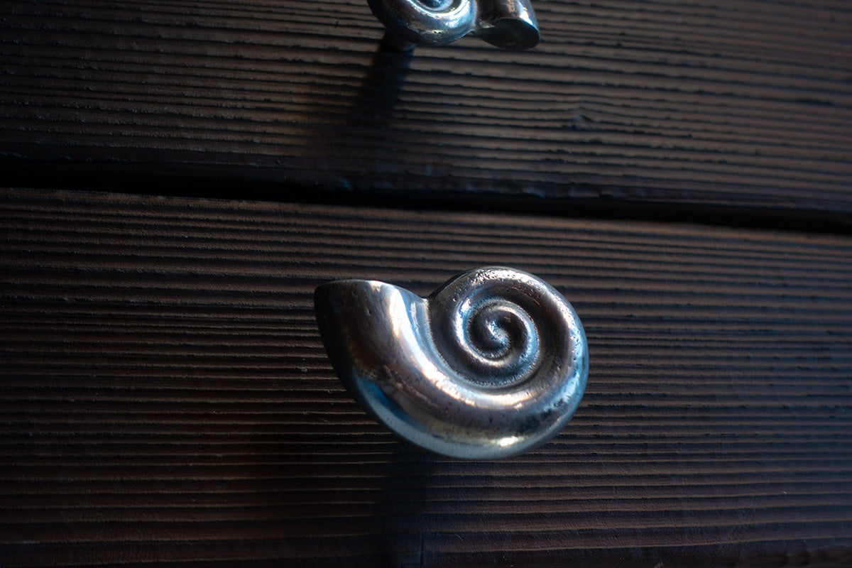 Seashell drawer & door handle - €85 — - Distil Ennui ™ est.1990. studio-produced object exploring material accountability and long-term use.