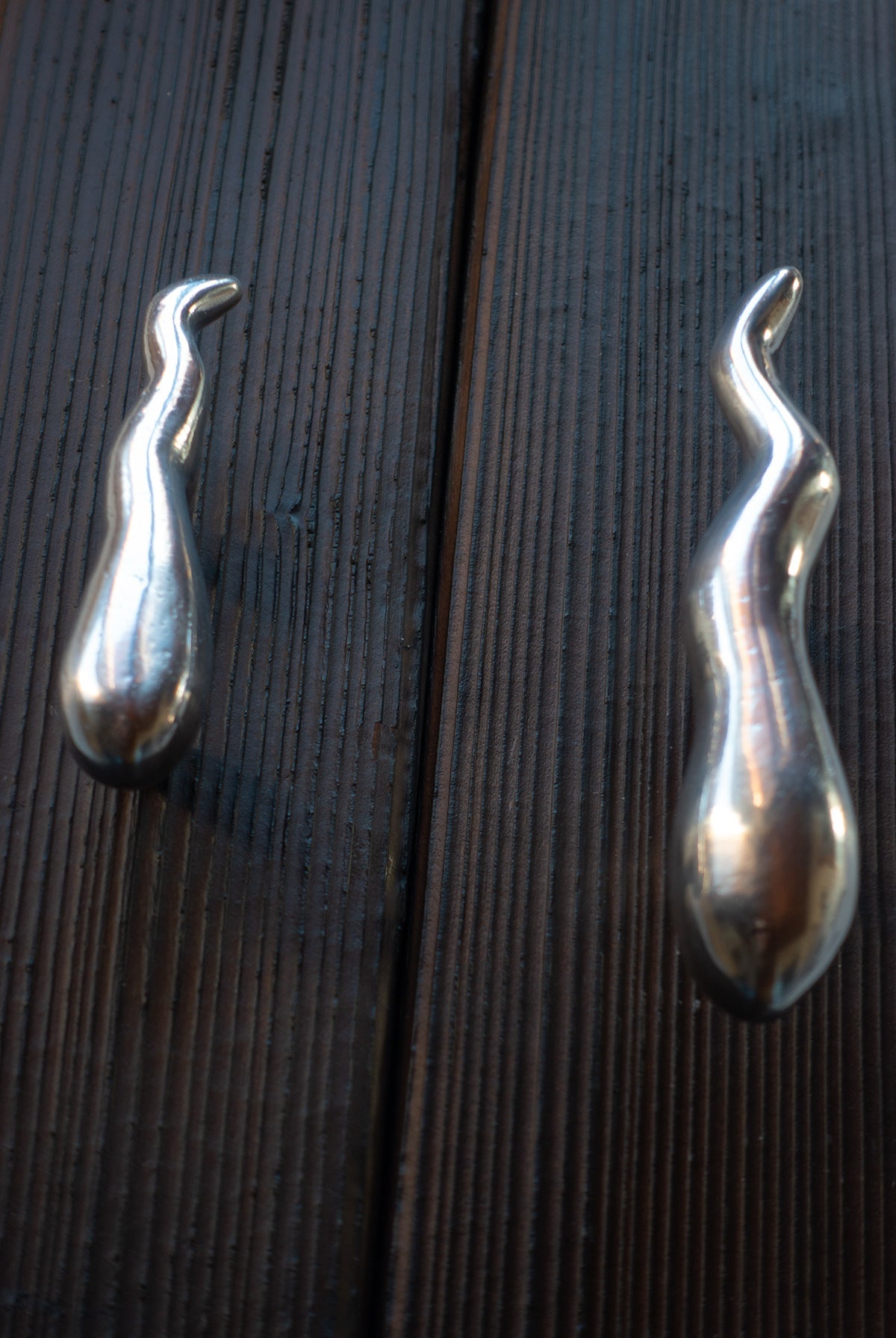 Sculptural drawer handle with playful design