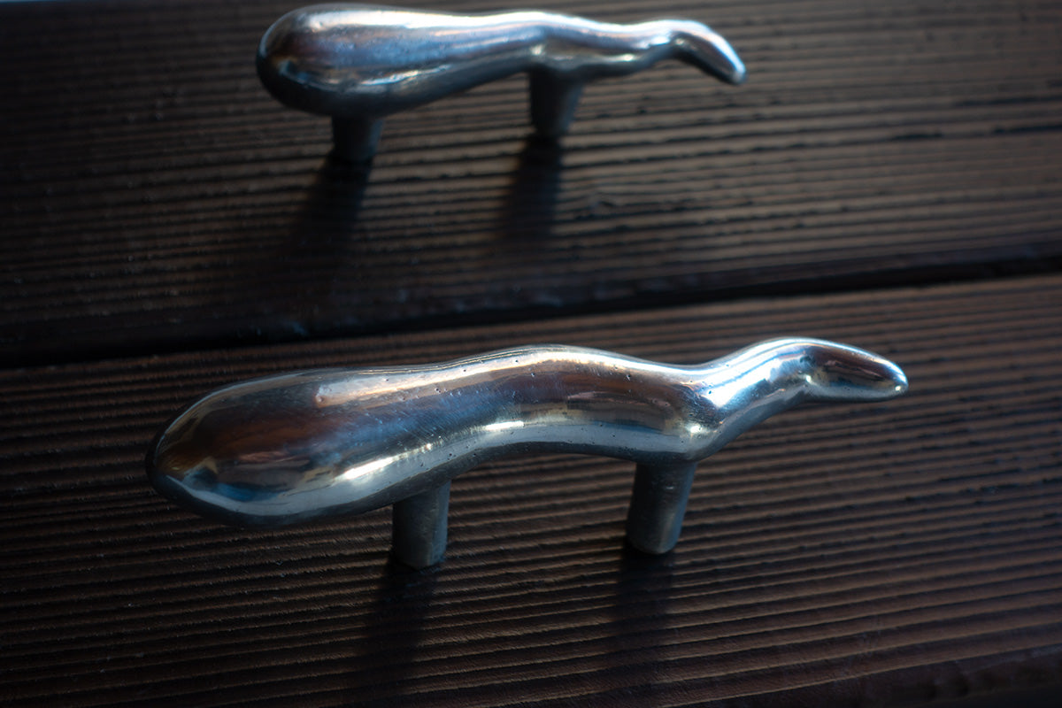 Eco-friendly tadpole door handle with screw fittings