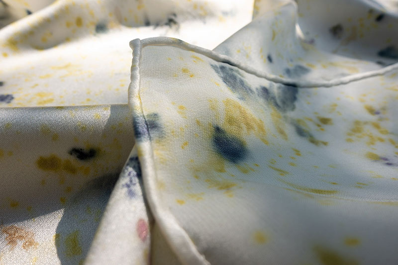 Sustainable floral silk scarf with hand-rolled edge