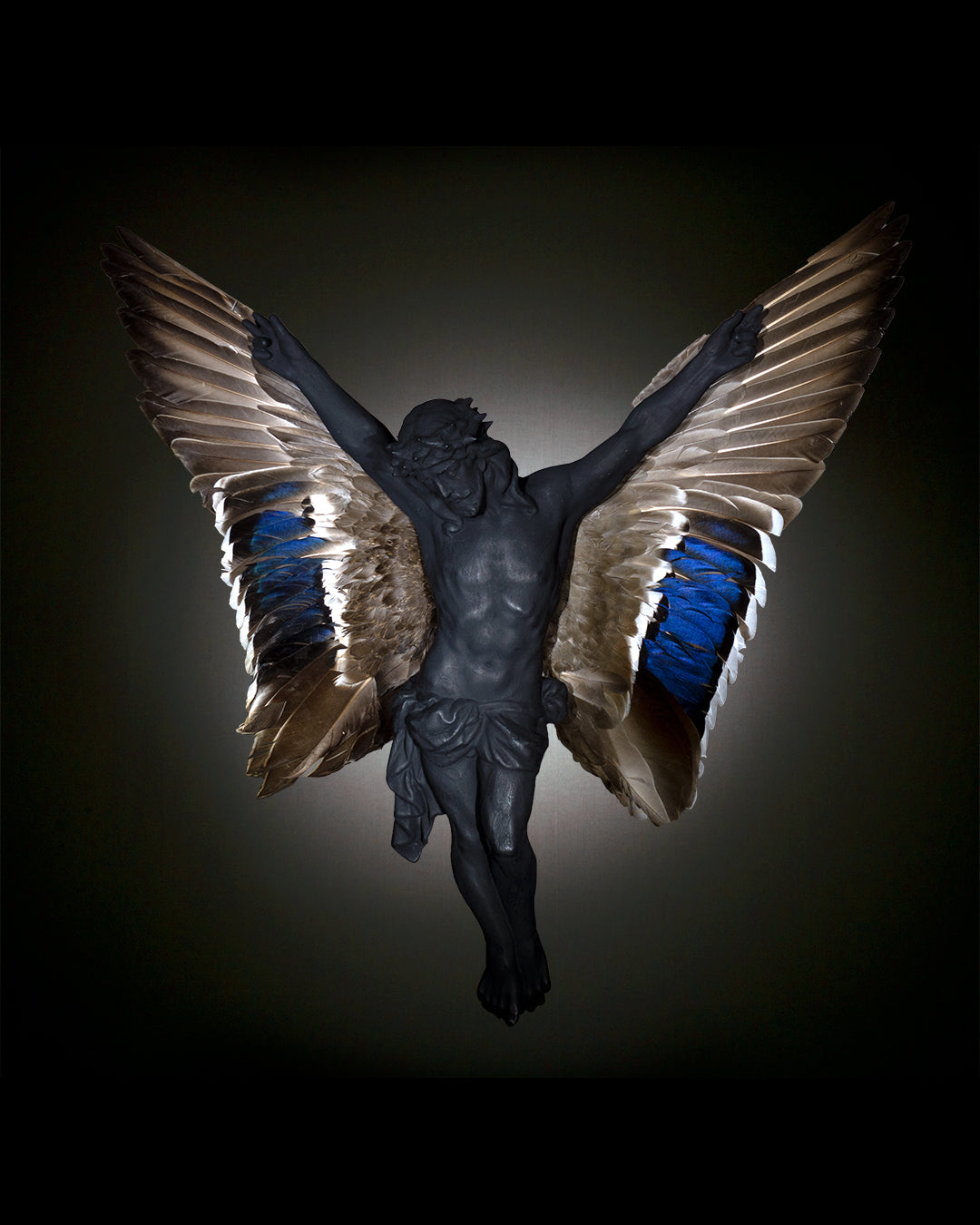 Carbon Black Jesus With Wings sculpture