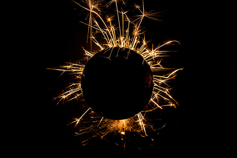 Underwater photograph exploding flower series sparks energy shot Warm Low Light tonality from the Fusion series