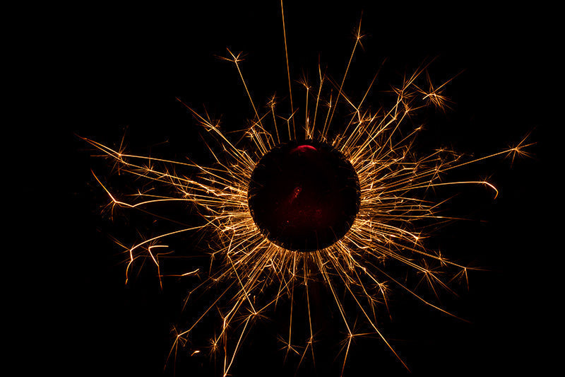 Underwater photograph exploding flower series sparks energy shot Warm Low Light tonality from the Fusion series