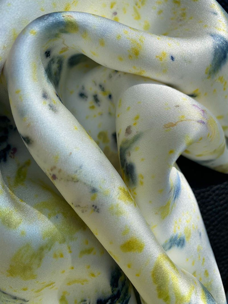 Eco-printed square scarf styled around neck
