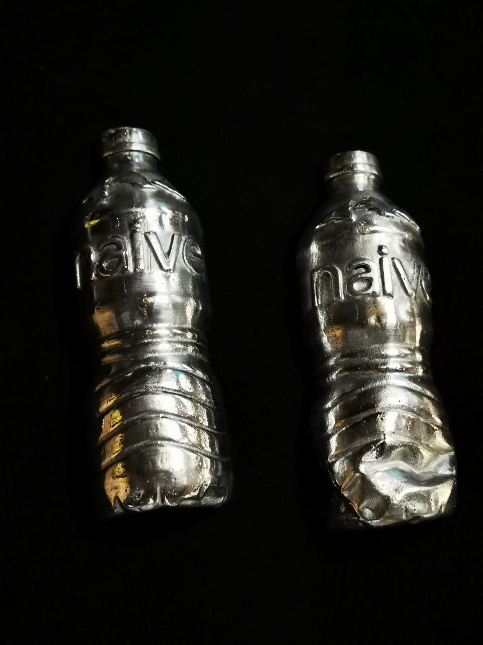 contemporary sculpture made from water cans