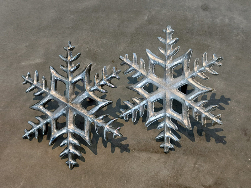 Hand-cast snowflake wind chime with leather hanger