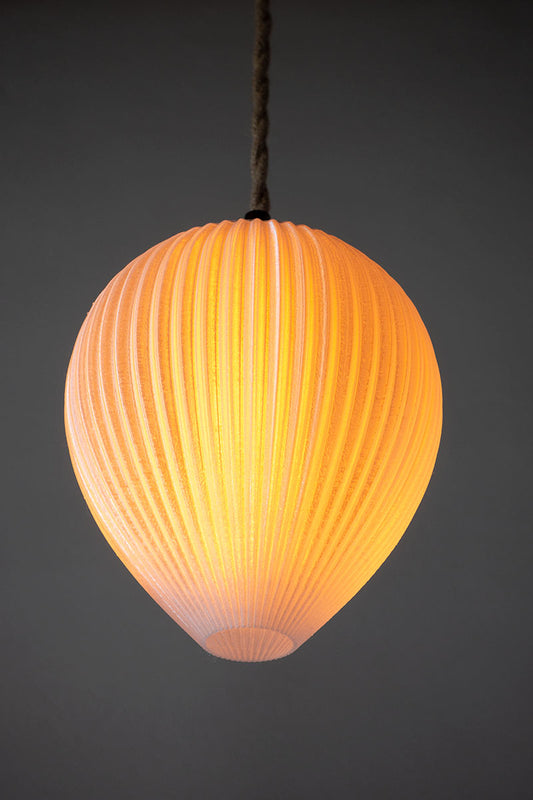 Circular lighting range designed by humans and made by robots in the studio