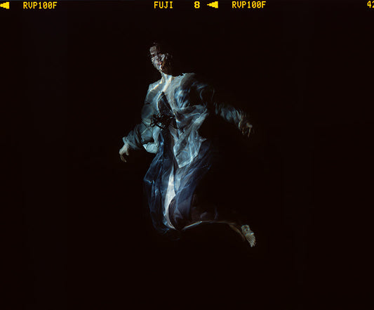 Mythical Melancholy Photography: Chiaroscuro Depictions of Dissolved Sadness