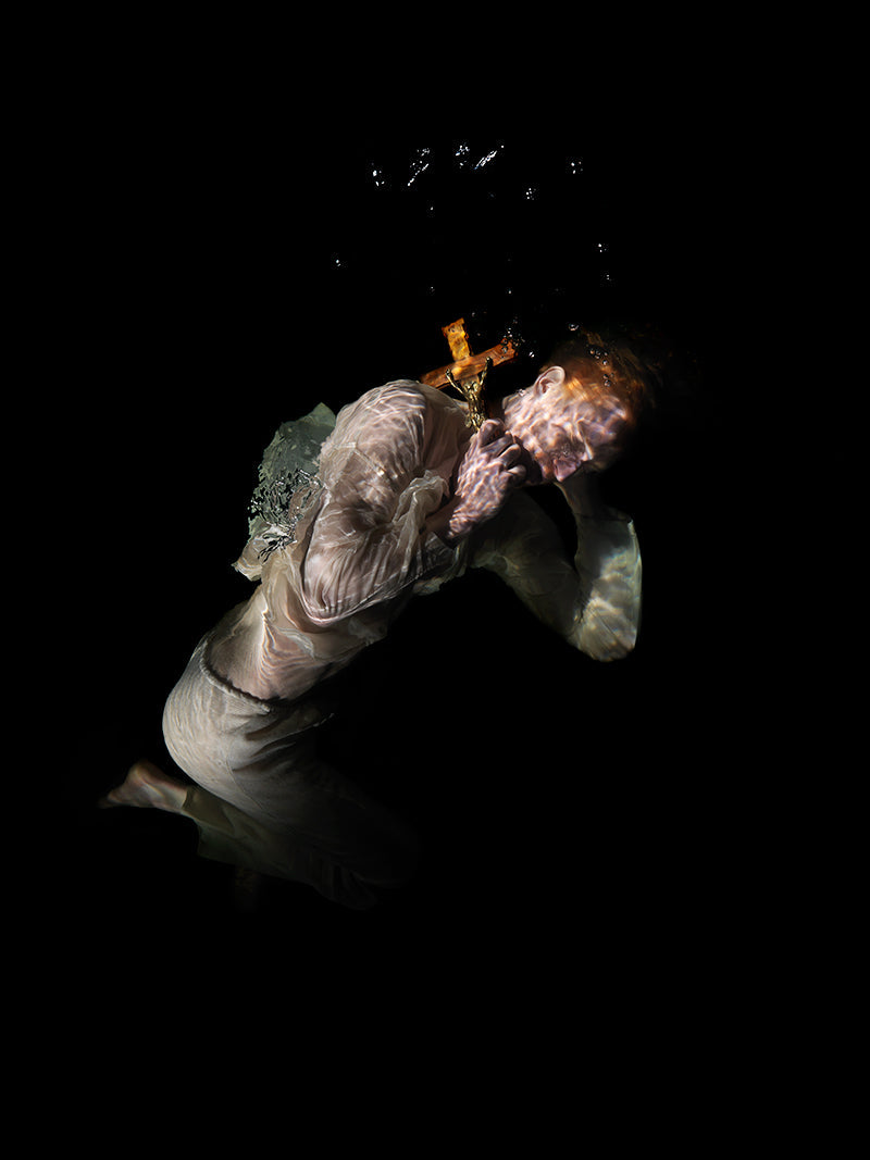 Veiled in Shadow: Underwater Depictions of Dissolved Sadness