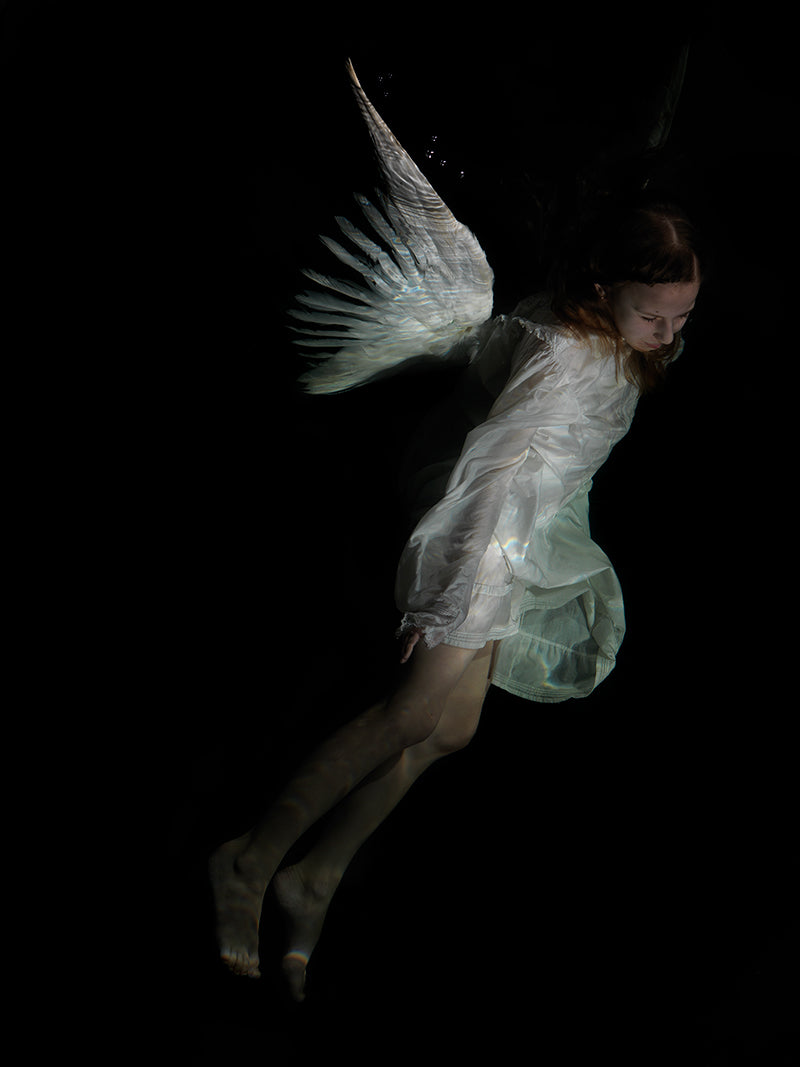 Underwater Angels: Exploring Mythical Depths in Chiaroscuro