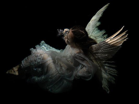 Lost in Myth: Chiaroscuro Depictions of Underwater Sadness