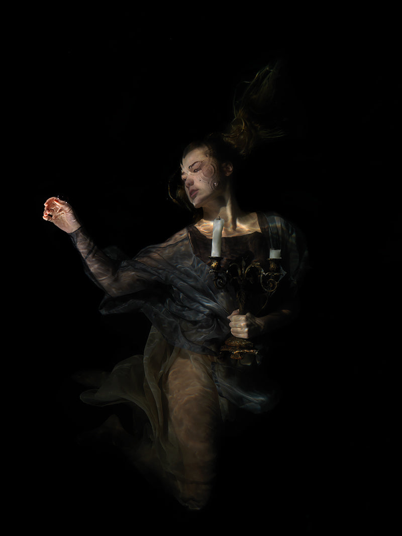 Diving into Drama: Underwater Photographs in the Style of Caravaggio