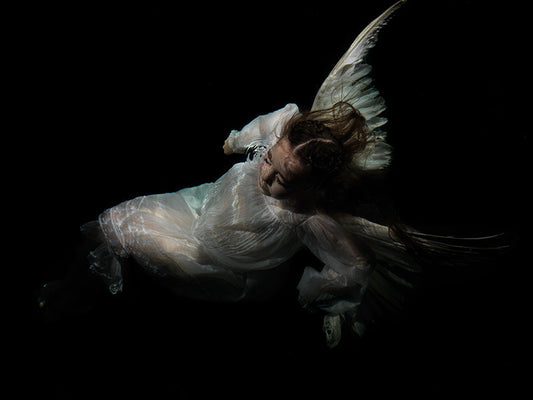Submerged Drama: Underwater Photography Capturing Caravaggio