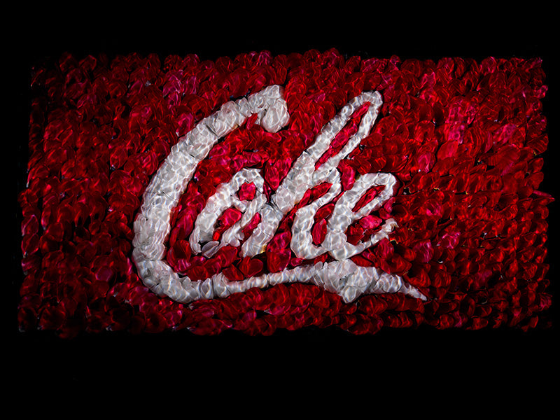 recreating famous brand logos in flower floral tributers