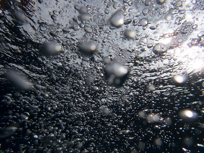 Hypnotic Bubble Trails in Open crystal blue Ocean Waters