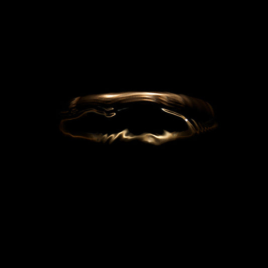 Shifting Gold Angels Halo set against Black in deep Water