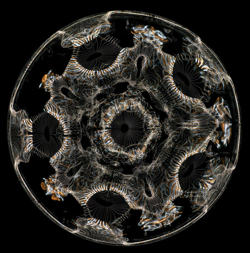Cymatic Flux: Gravitational Waves Explored in Einstein's Dynamic Photography