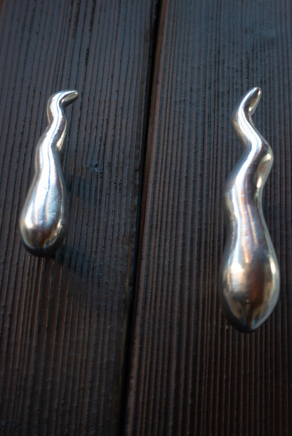 Sculptural drawer handle with playful design