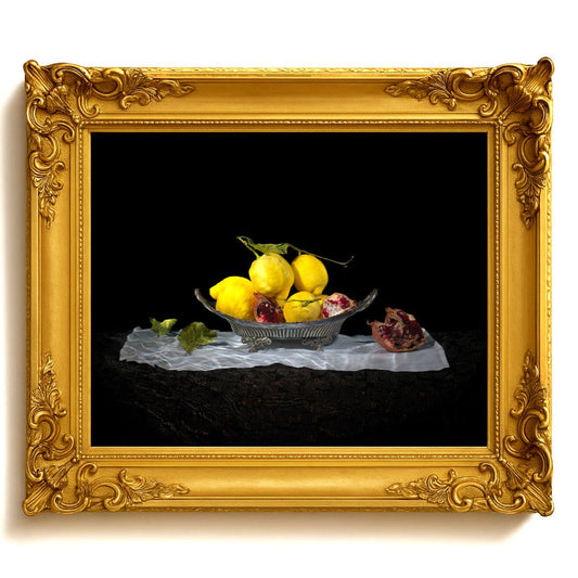 still life of pomegranate and lemons in a silver bowl