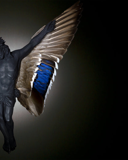 Carbon jesus with wings sculpture