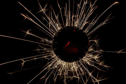 Underwater photograph exploding flower series sparks energy shot Warm Low Light tonality from the Fusion series