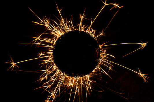 Underwater photograph exploding flower series sparks energy shot Warm Low Light tonality from the Fusion series