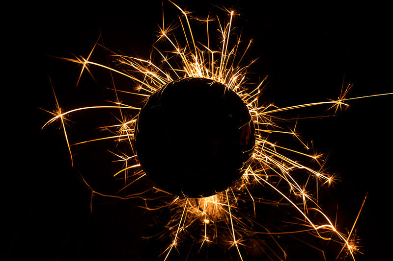 Underwater photograph exploding flower series sparks energy shot Warm Low Light tonality from the Fusion series