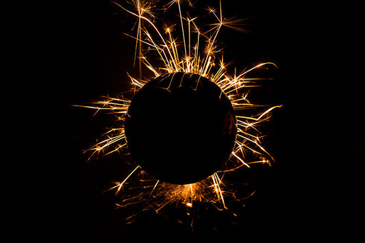 Underwater photograph exploding flower series sparks energy shot Warm Low Light tonality from the Fusion series