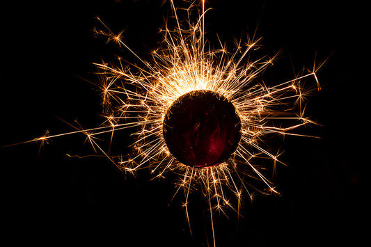 Underwater photograph exploding flower series sparks energy shot Warm Low Light tonality from the Fusion series