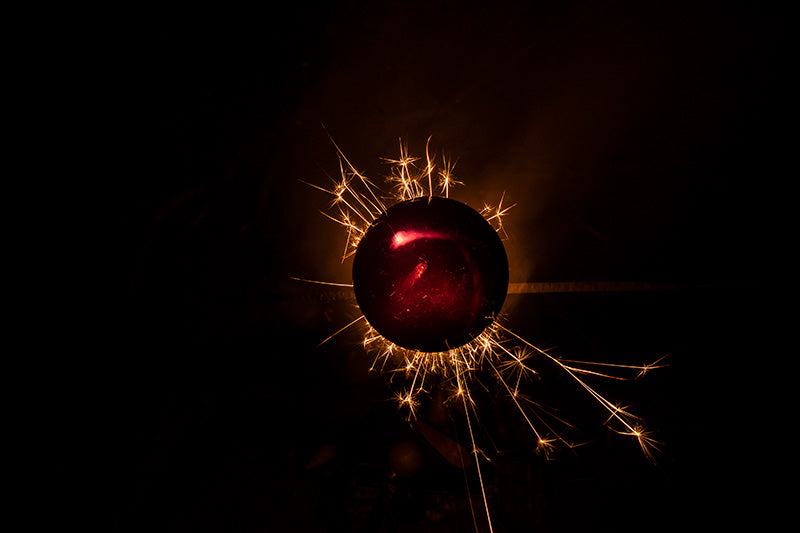 Underwater photograph exploding flower series sparks energy shot Warm Low Light tonality from the Fusion series