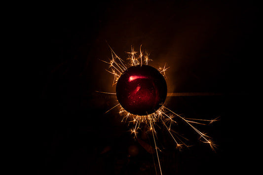 Underwater photograph exploding flower series sparks energy shot Warm Low Light tonality from the Fusion series