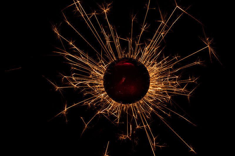 Underwater photograph exploding flower series sparks energy shot Warm Low Light tonality from the Fusion series