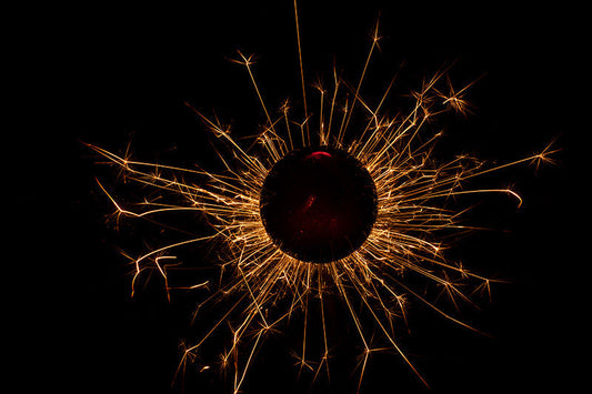 Underwater photograph exploding flower series sparks energy shot Warm Low Light tonality from the Fusion series