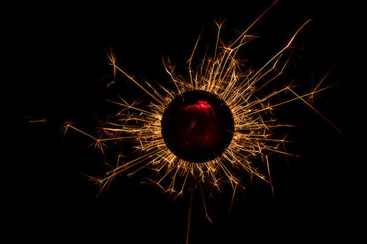 Underwater photograph exploding flower series sparks energy shot Warm Low Light tonality from the Fusion series