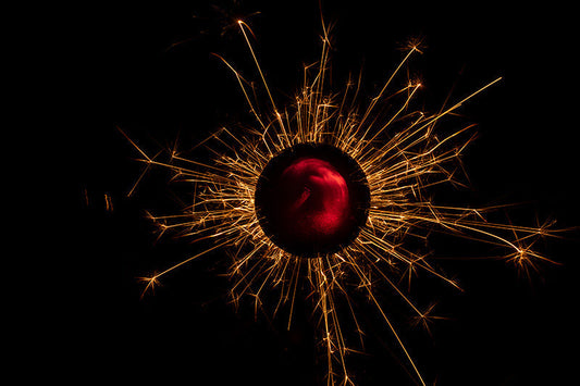 Underwater photograph exploding flower series sparks energy shot Warm Low Light tonality from the Fusion series