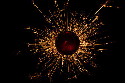 Underwater photograph exploding flower series sparks energy shot Warm Low Light tonality from the Fusion series