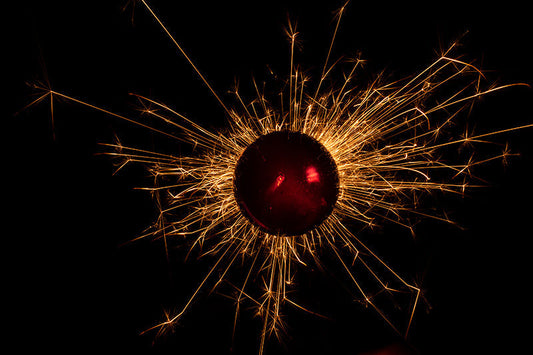 Underwater photograph exploding flower series sparks energy shot Warm Low Light tonality from the Fusion series