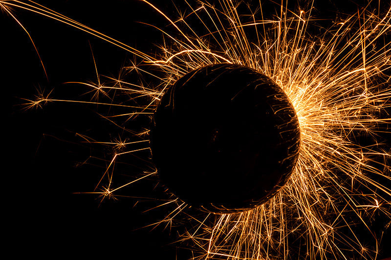 Underwater photograph exploding flower series sparks energy shot Warm Low Light tonality from the Fusion series