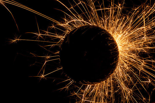 Underwater photograph exploding flower series sparks energy shot Warm Low Light tonality from the Fusion series