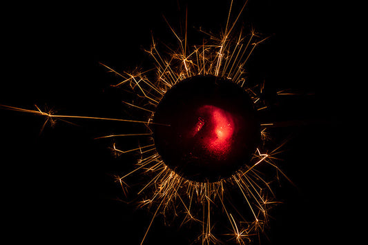 Underwater photograph exploding flower series sparks energy shot Warm Low Light tonality from the Fusion series