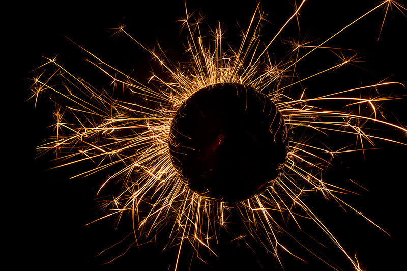 Underwater photograph exploding flower series sparks energy shot Warm Low Light tonality from the Fusion series