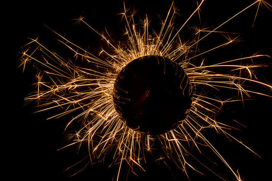 Underwater photograph exploding flower series sparks energy shot Warm Low Light tonality from the Fusion series