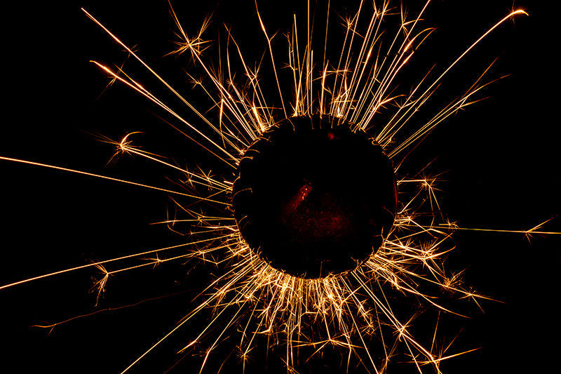 Underwater photograph exploding flower series sparks energy shot Warm Low Light tonality from the Fusion series